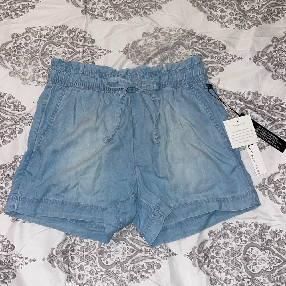 Retro 90s style light wash shorts